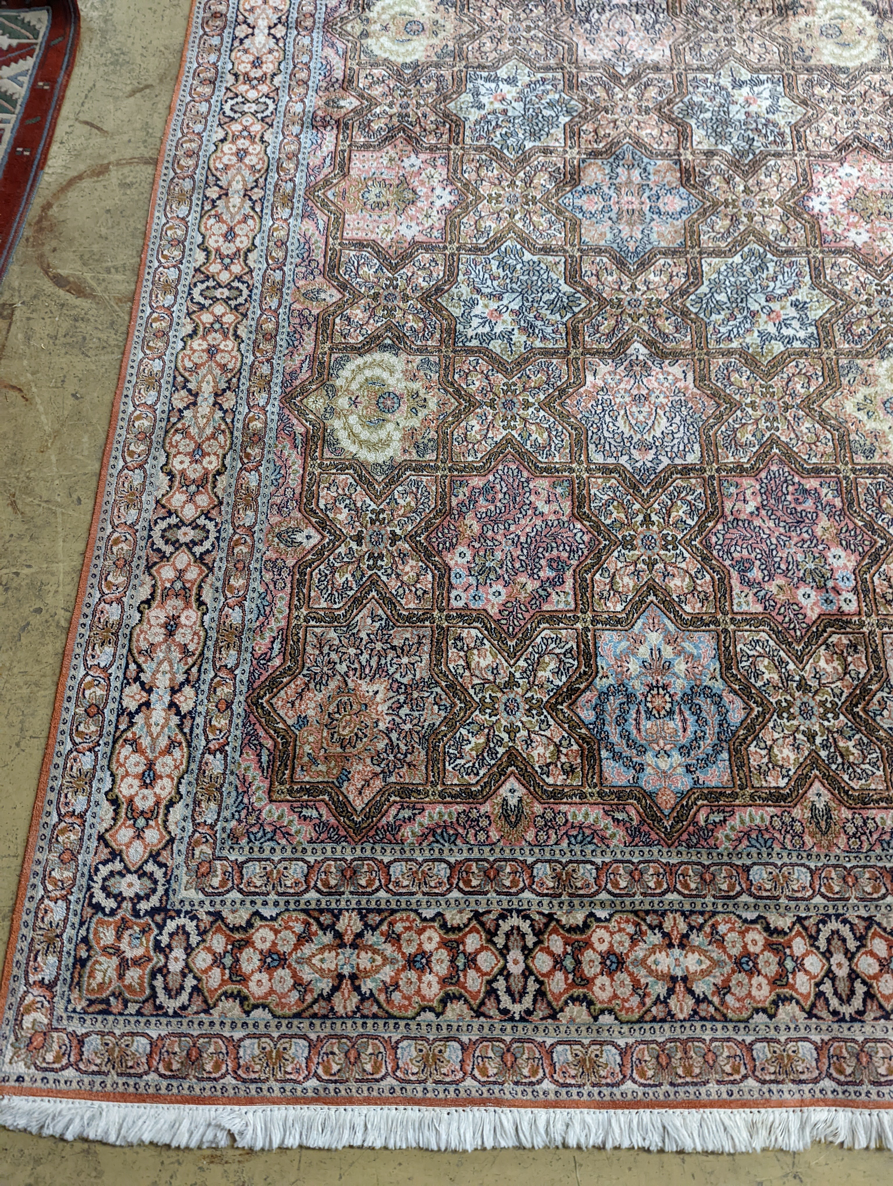Two Turkish rugs and a Persian rugs. Largest, 284x172cm.